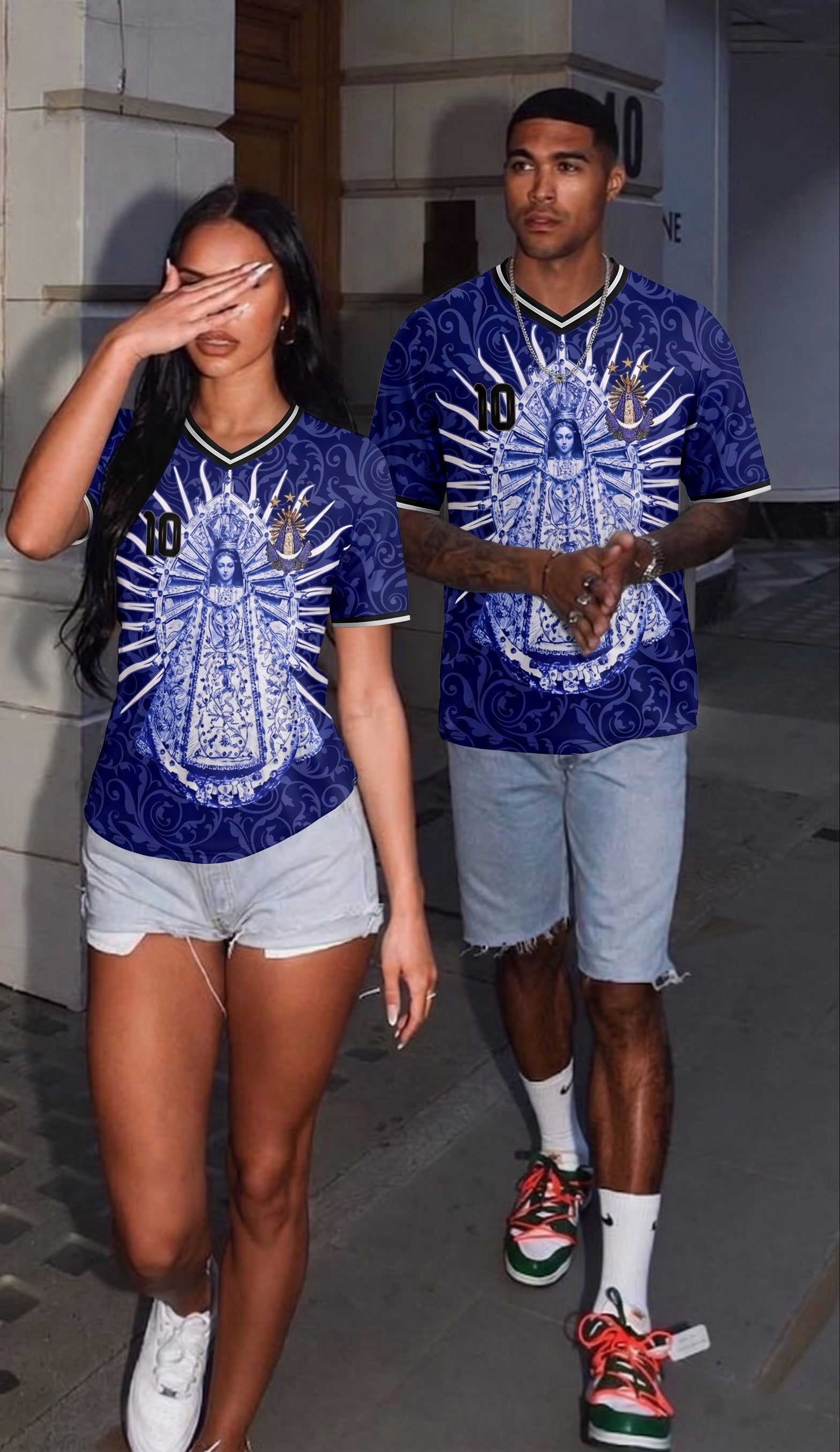 Front and back view of Varldens Argentina 2026 Away Jersey with Virgen de Luján art and Sol de Mayo emblem - Navy blue soccer streetwear