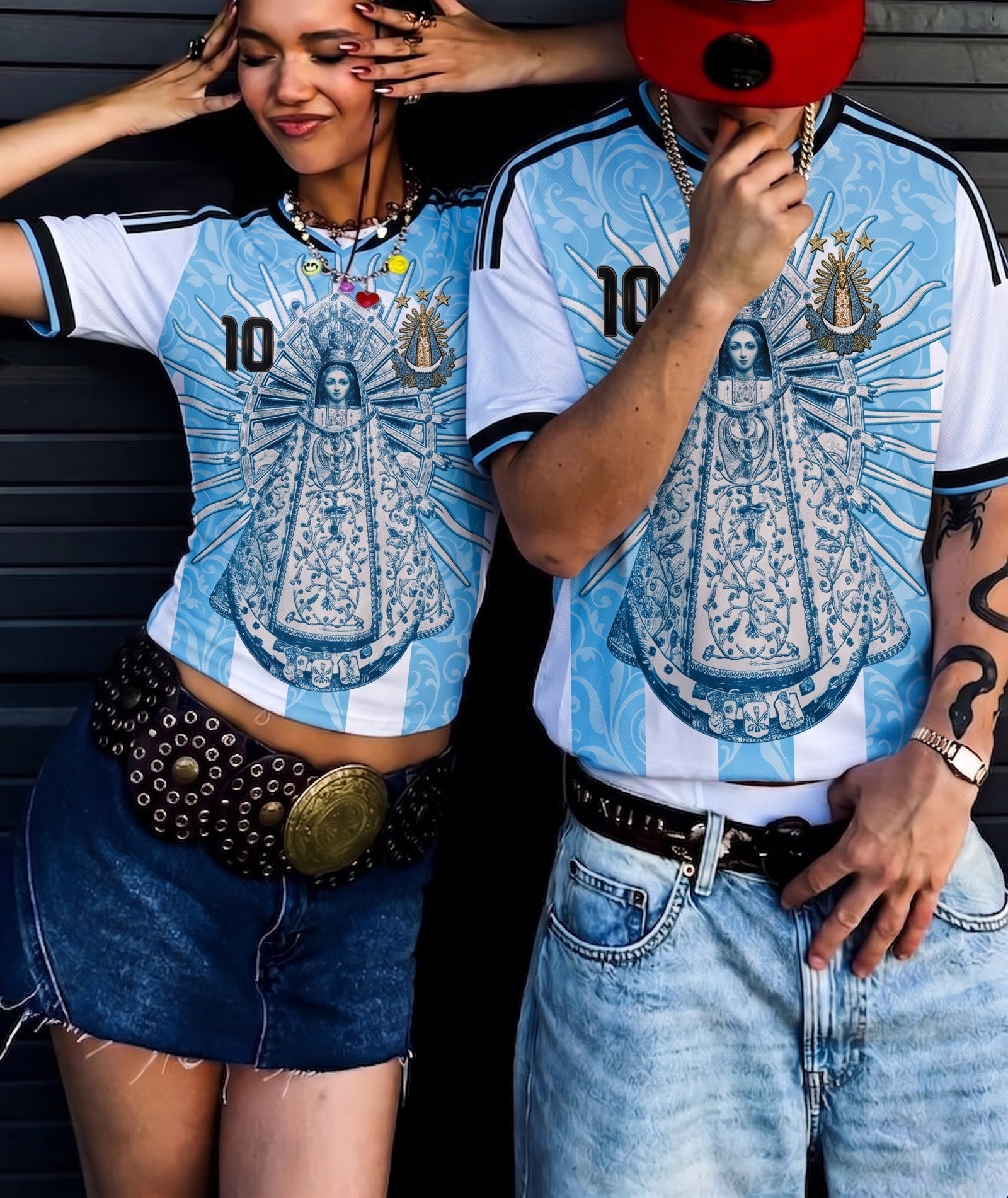 Model wearing Varldens Argentina soccer jersey with Virgen de Luján and Fileteado Porteño art - Blue and white striped heritage shirt