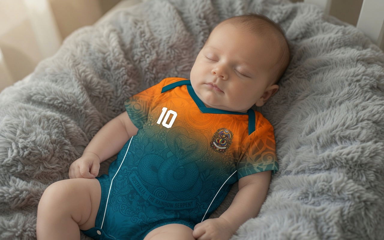 Front and back view of Australia 2026 away jersey in orange and teal gradient with Rainbow Serpent motifs