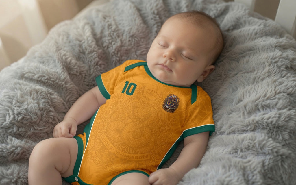 Front and back view of Australia 2026 home jersey in gold and green with Rainbow Serpent and Aboriginal tribal motifs