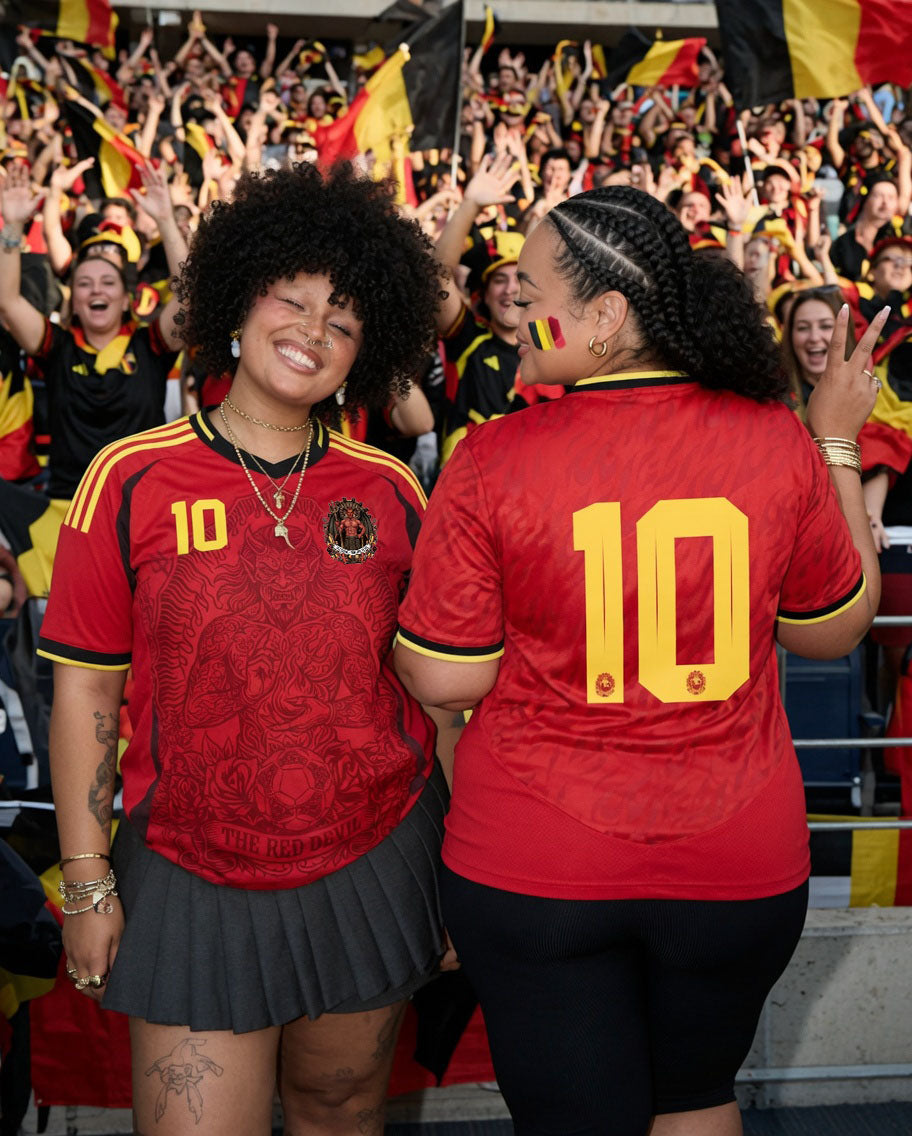 Front and back view of Belgium 2026 home jersey in red with The Red Devil and sublimated flame motifs