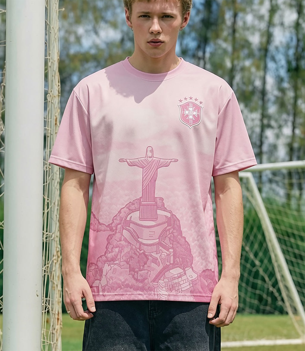 Front and back view of Brazil special edition jersey in pastel pink gradient with Christ the Redeemer mountain graphics
