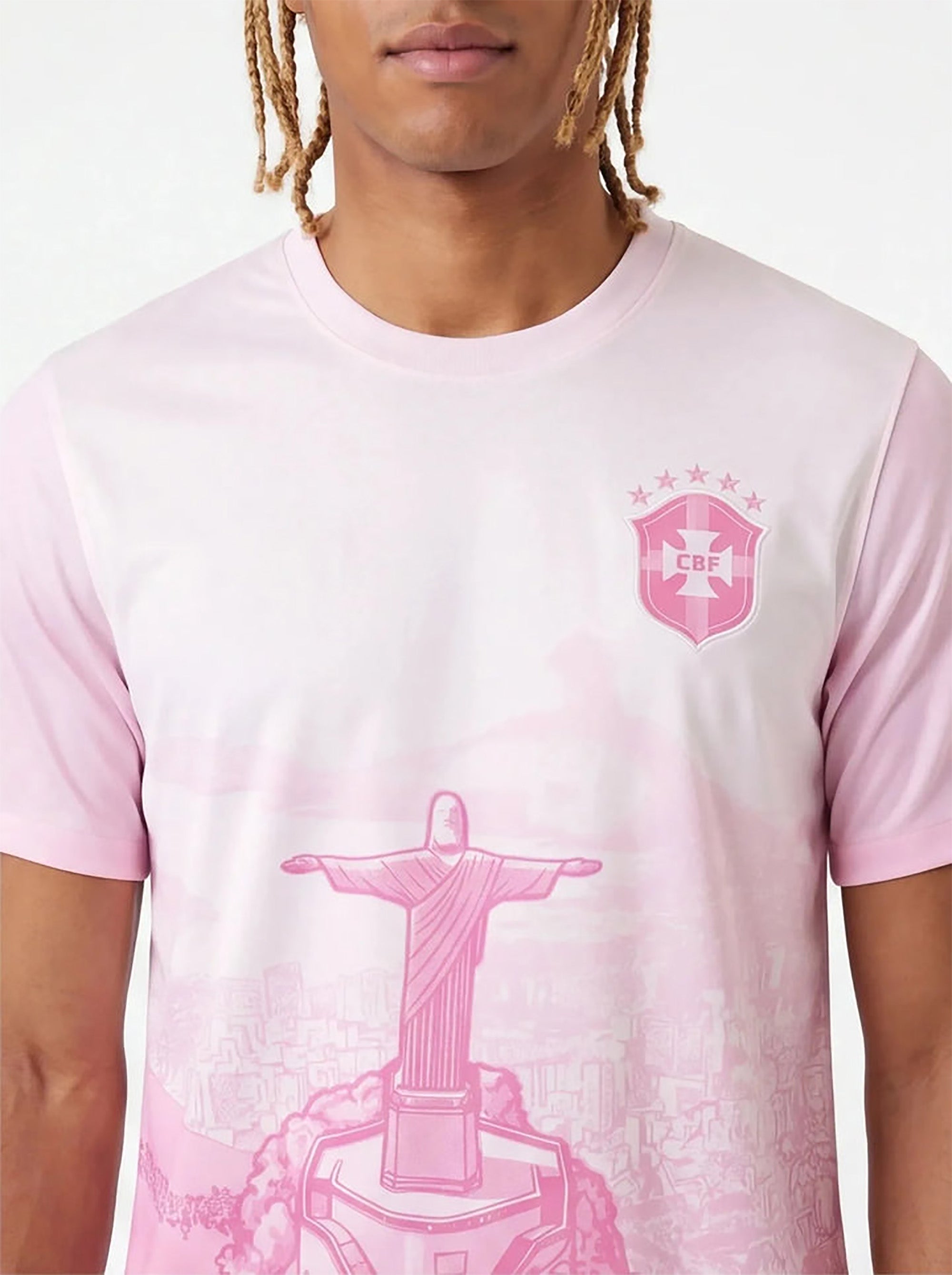 Front and back view of Brazil special edition jersey in pastel pink gradient with Christ the Redeemer mountain graphics