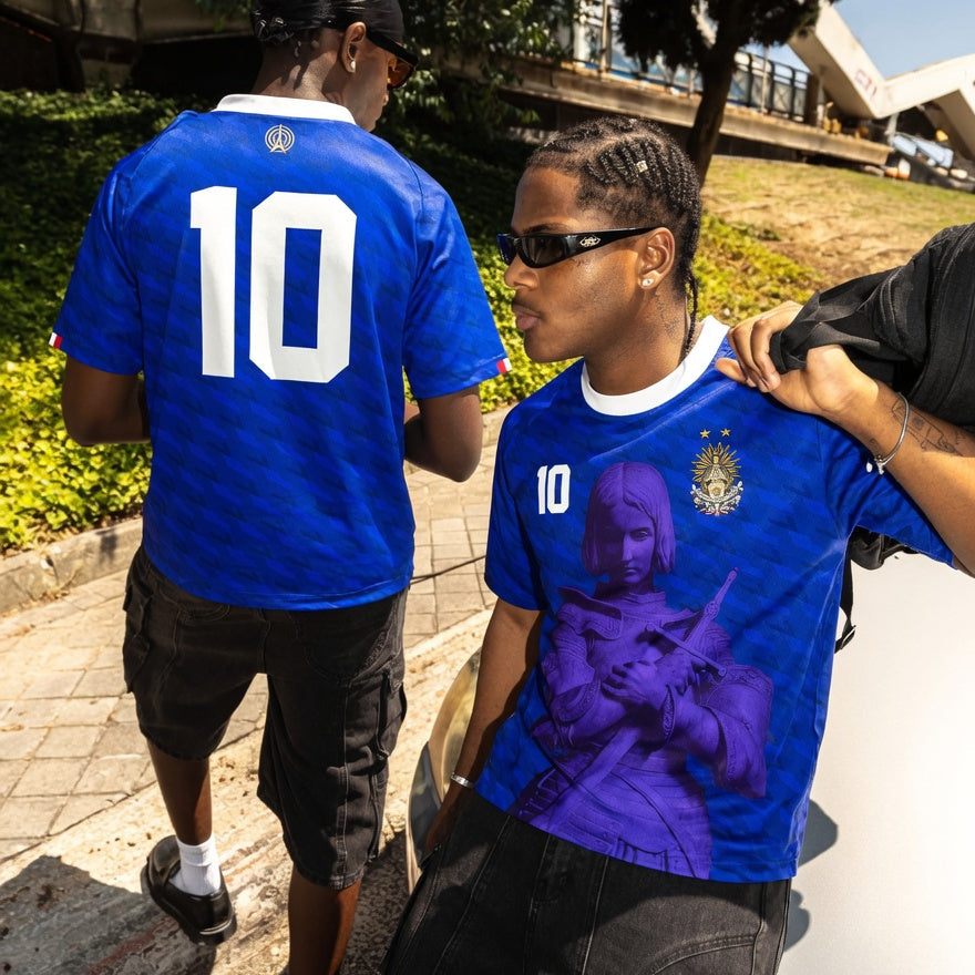 Front and back view of France 2026 home jersey in blue with Joan of Arc graphics and sublimated diagonal patterns