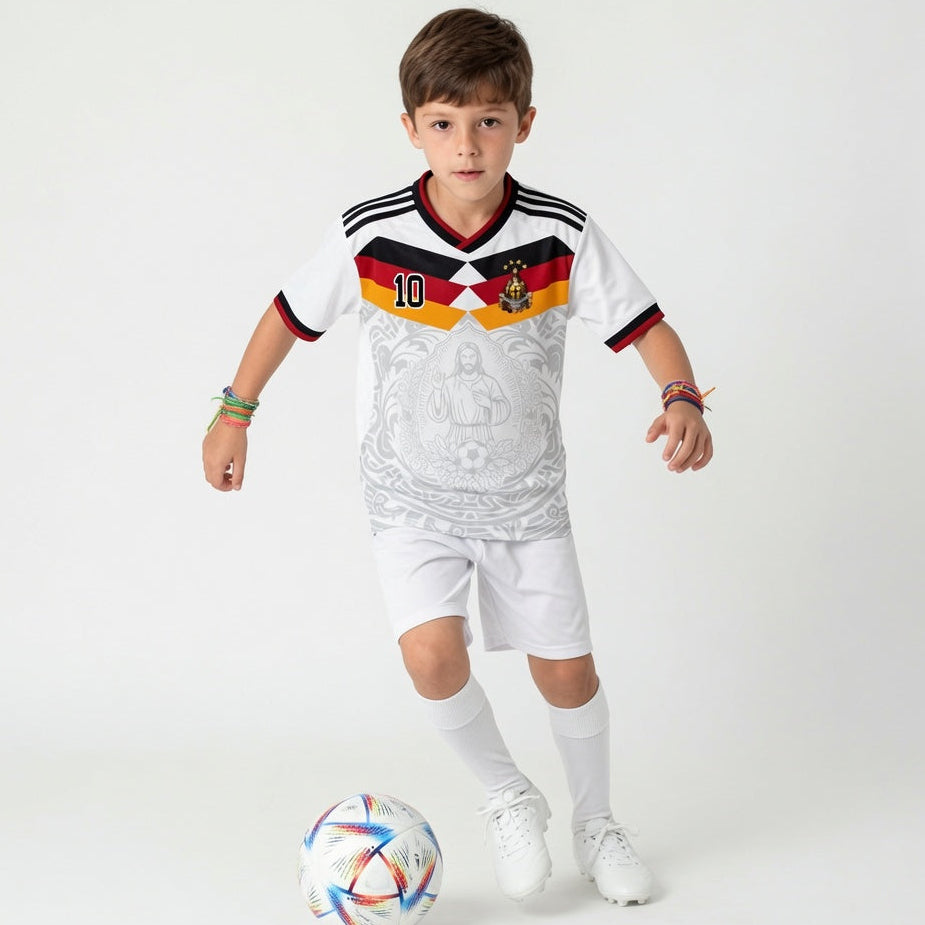 Front and back view of Germany 2026 home jersey in white with Jesus Christ graphics and German tricolor chevron stripes by Varldens