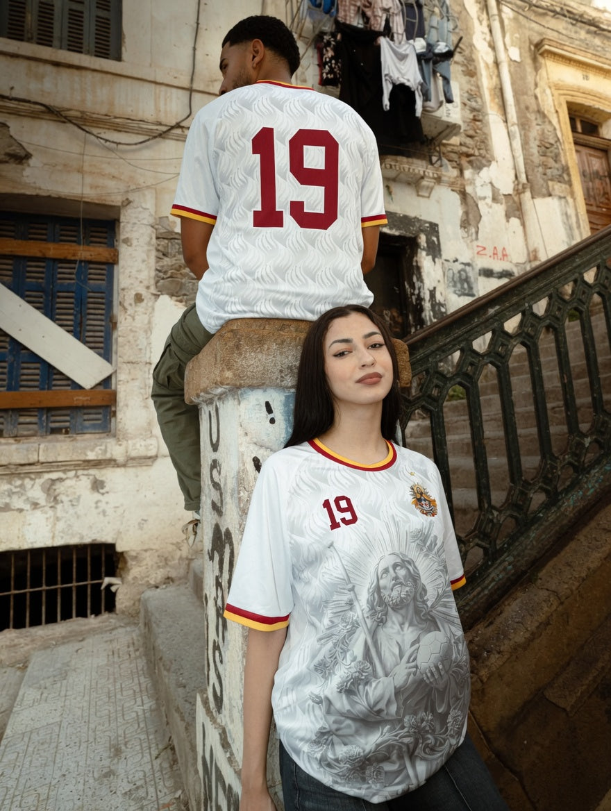 Front and back view of Spain 2026 away jersey in white with Saint James graphics and red number 19