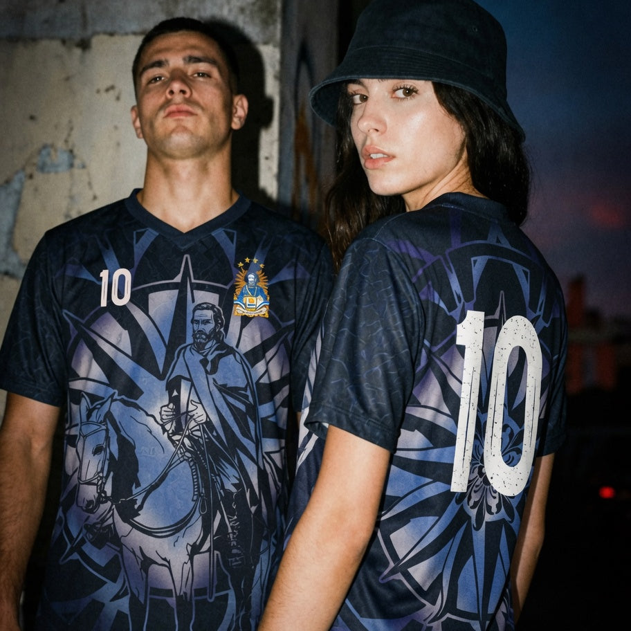 Front and back view of Uruguay 2026 away jersey in midnight navy with silver Jose Artigas and Sun of May motifs