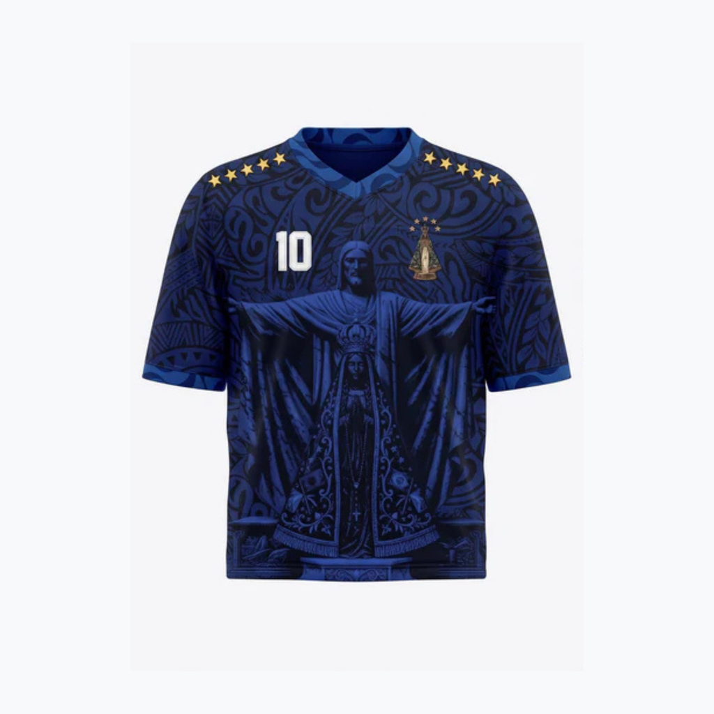 Special edition Varldens Brazil soccer jersey featuring embossed Christ the Redeemer and Our Lady of Aparecida, white number 10, and gold stars.